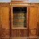 Important showcase library in fine wood and marquetry, stamped.