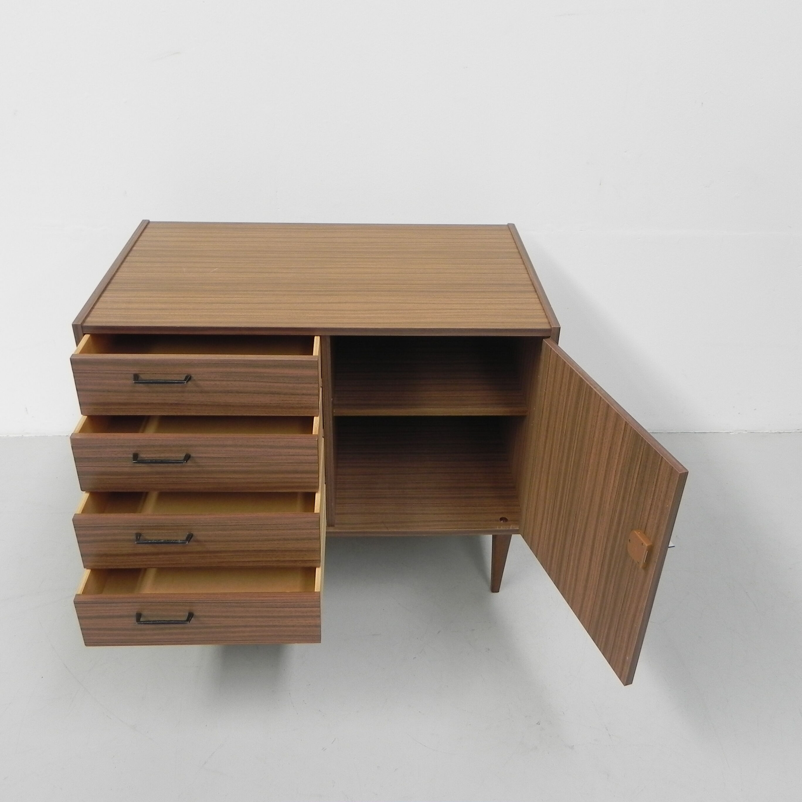 Vintage chest of drawers on tapered legs