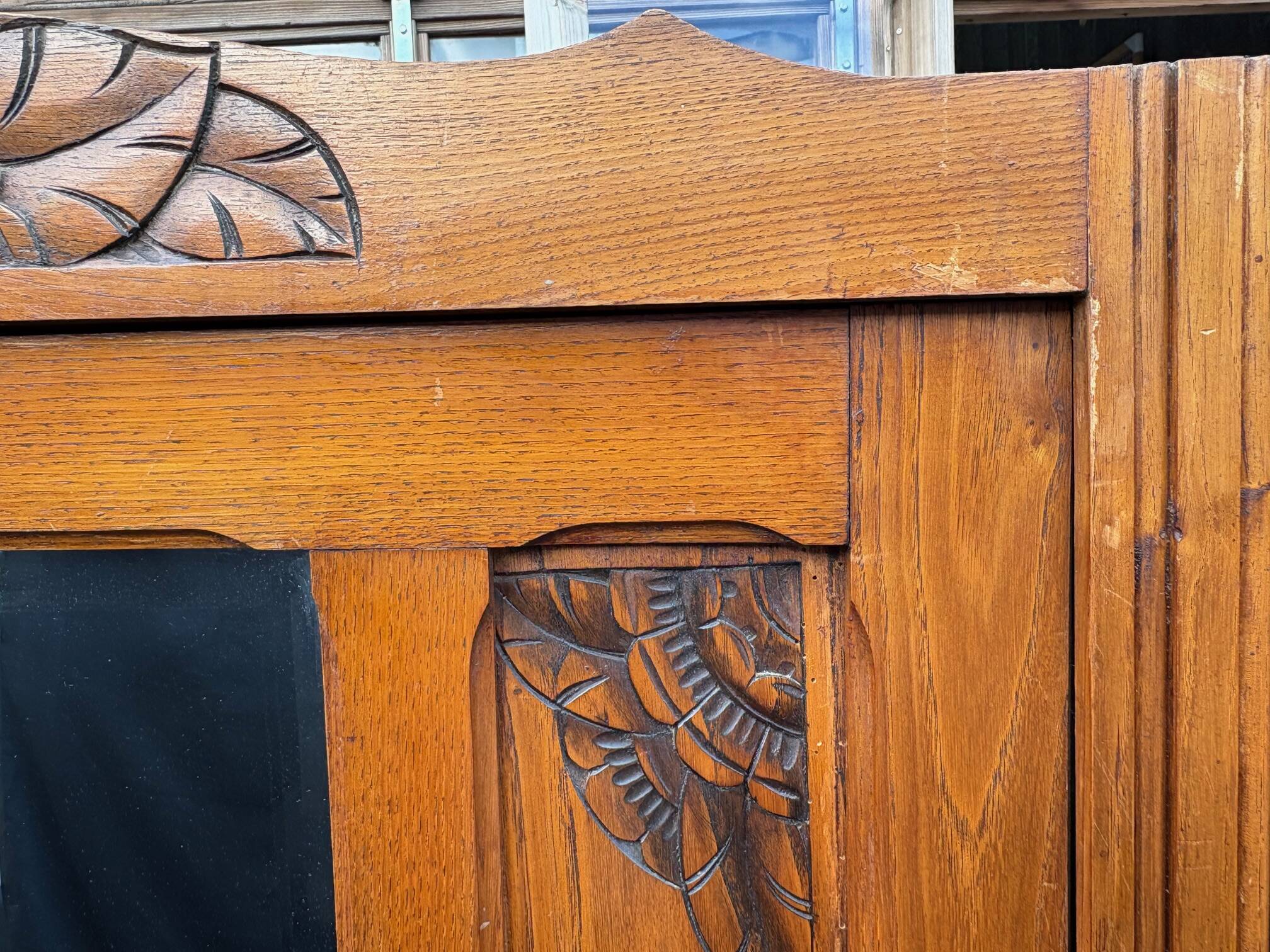 /Art Deco wardrobe with mirror in carved solid oak from the 20s/30s
