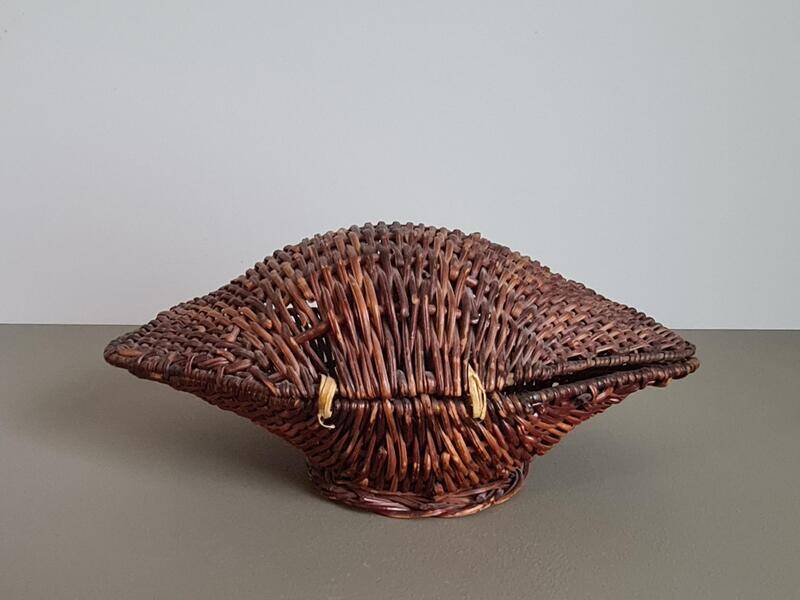 Vintage wicker shell basket, French bohemian decoration.