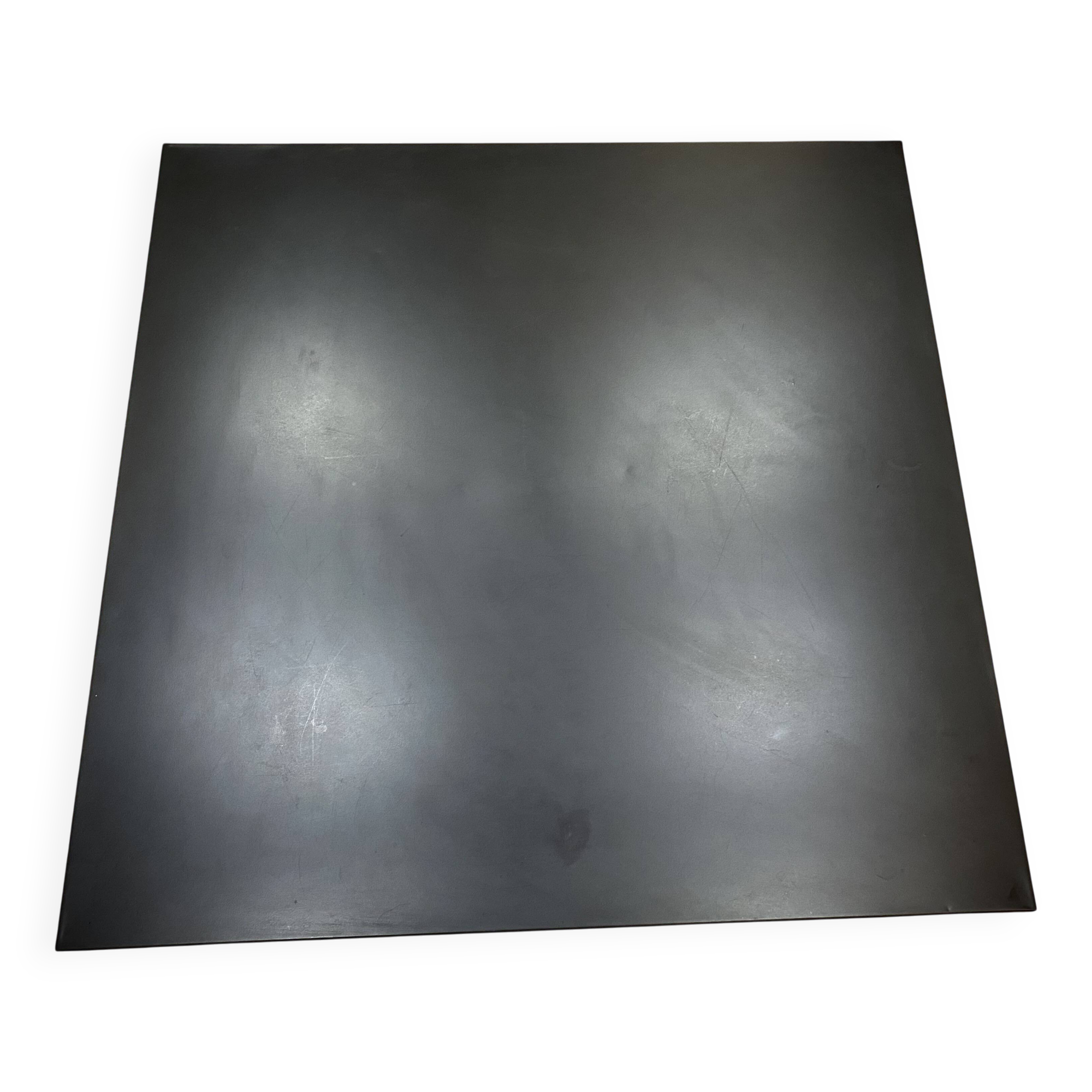 Mat black metal coffee table and 4 stackable stools.