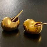 2 Snail-shaped salt pots in gold-colored porcelain