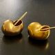 2 Snail-shaped salt pots in gold-colored porcelain