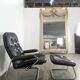 Stressless armchair and ottoman in leather from the 1970s.