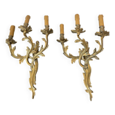 Pair of chiseled bronze sconces