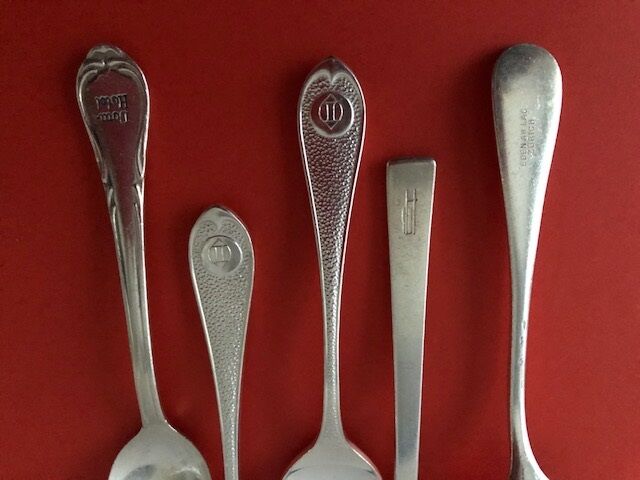 5 silver-plated hotel spoons