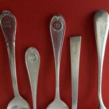 5 silver-plated hotel spoons