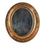 Antique oval mirror with original stucco and gilt wood frame, 37x31 cm. Beautiful patina.