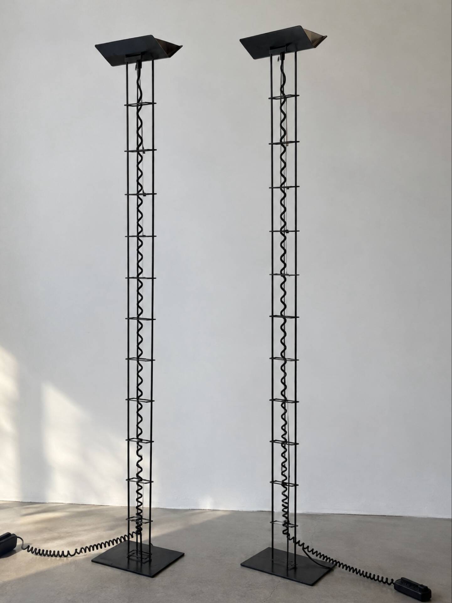 Pair of black Postmodern floor lamps by Arelux, 1980s