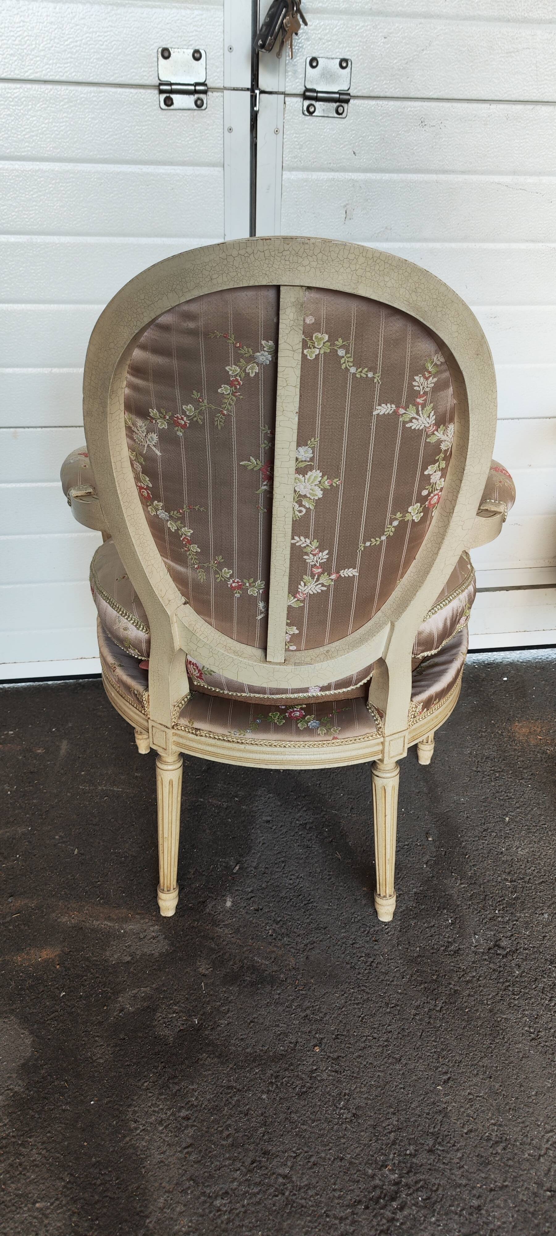 Old pair of Louis XVI style armchairs