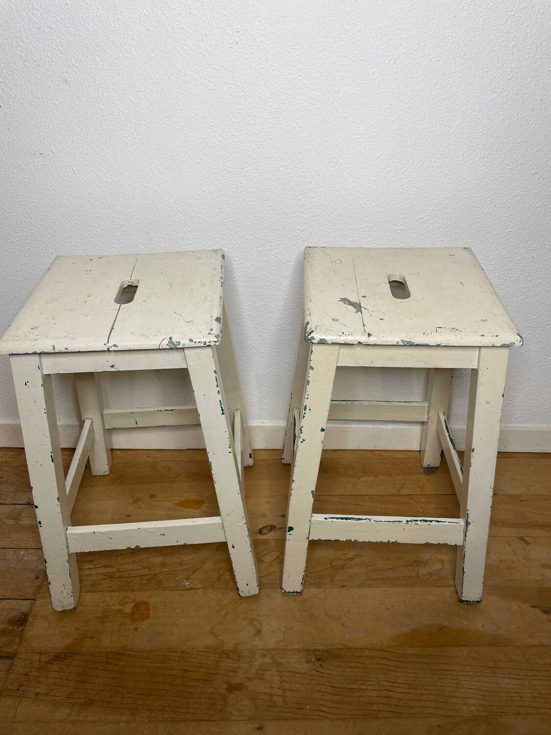 Pair of vintage cream stools in painted wood