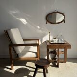 Small oval Art Deco mirror in brown and gold 33x54.