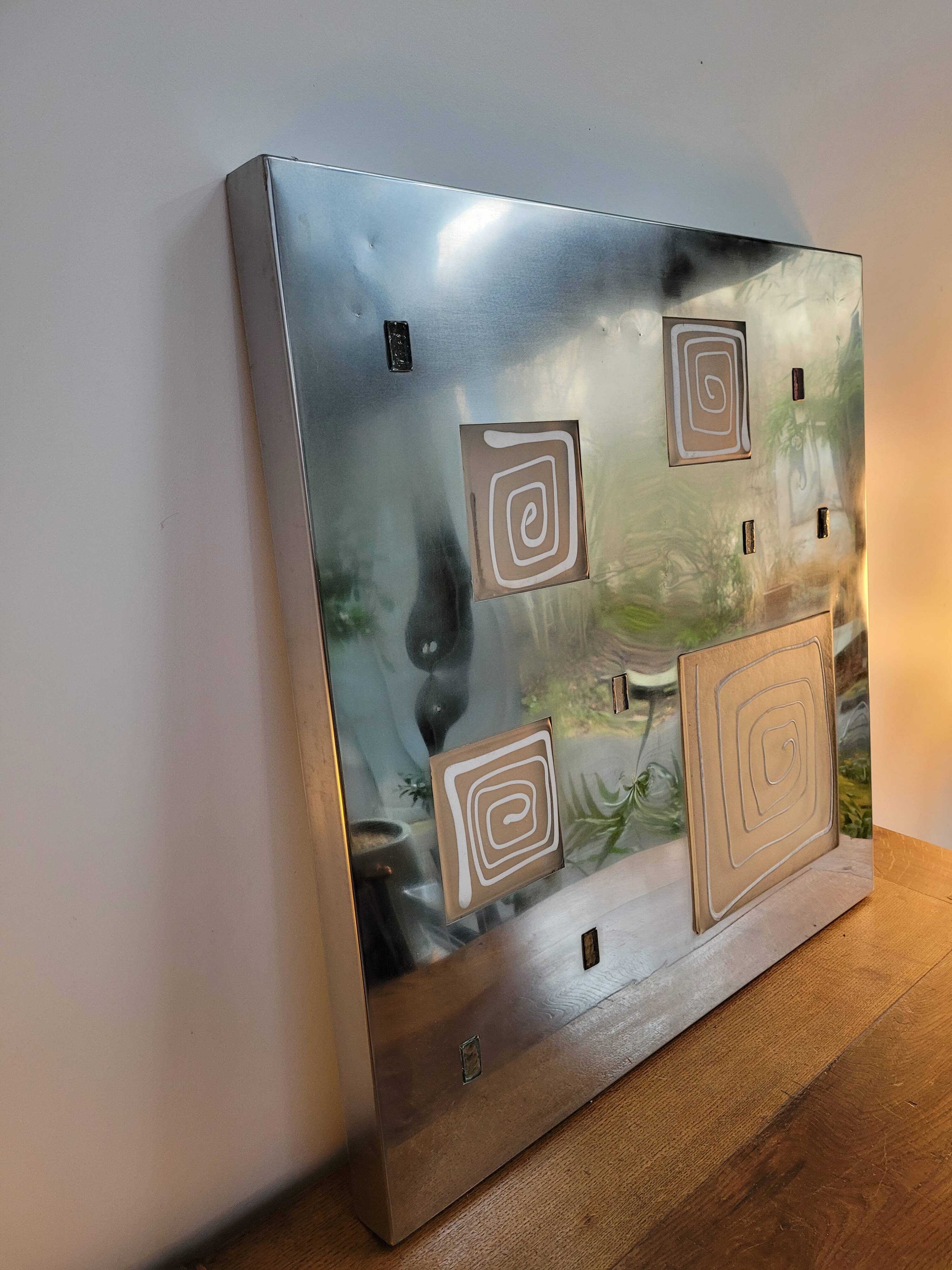 Wall light by Angelo Brotto, polished steel and Murano glass.
