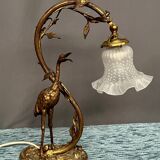 Gilded bronze lamp with the figure of a heron in Art Nouveau style.
