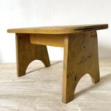 Low stool, plant stand in yellow painted wood