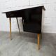 Baumann desk and chair, 1960s, Formica, wood and black, green seat