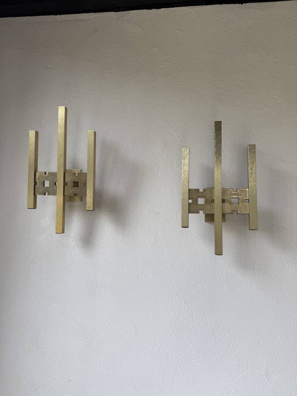 Pair of Regency brass wall lights in Italy