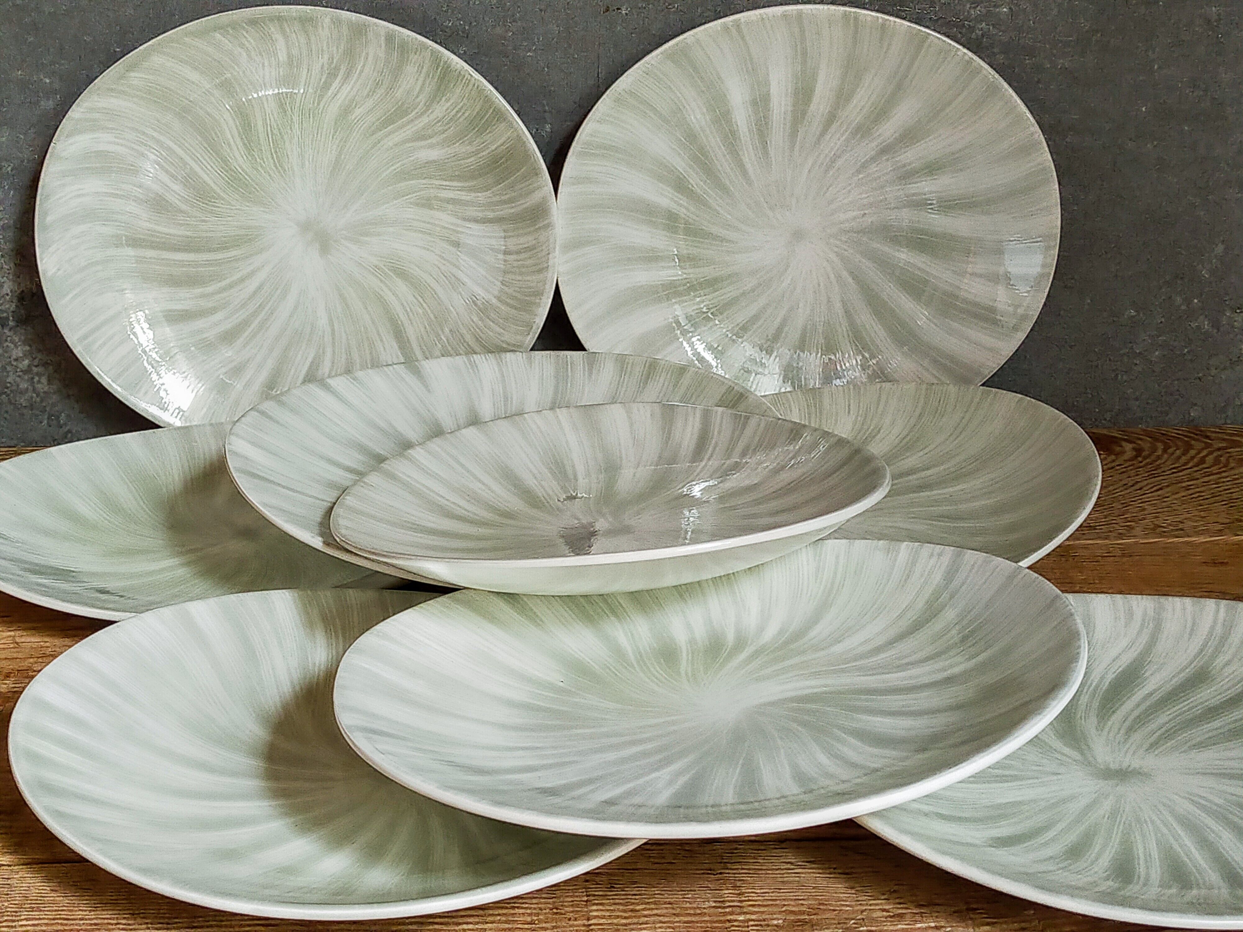 Nine earthenware plates from Salins-les-Bains vintage