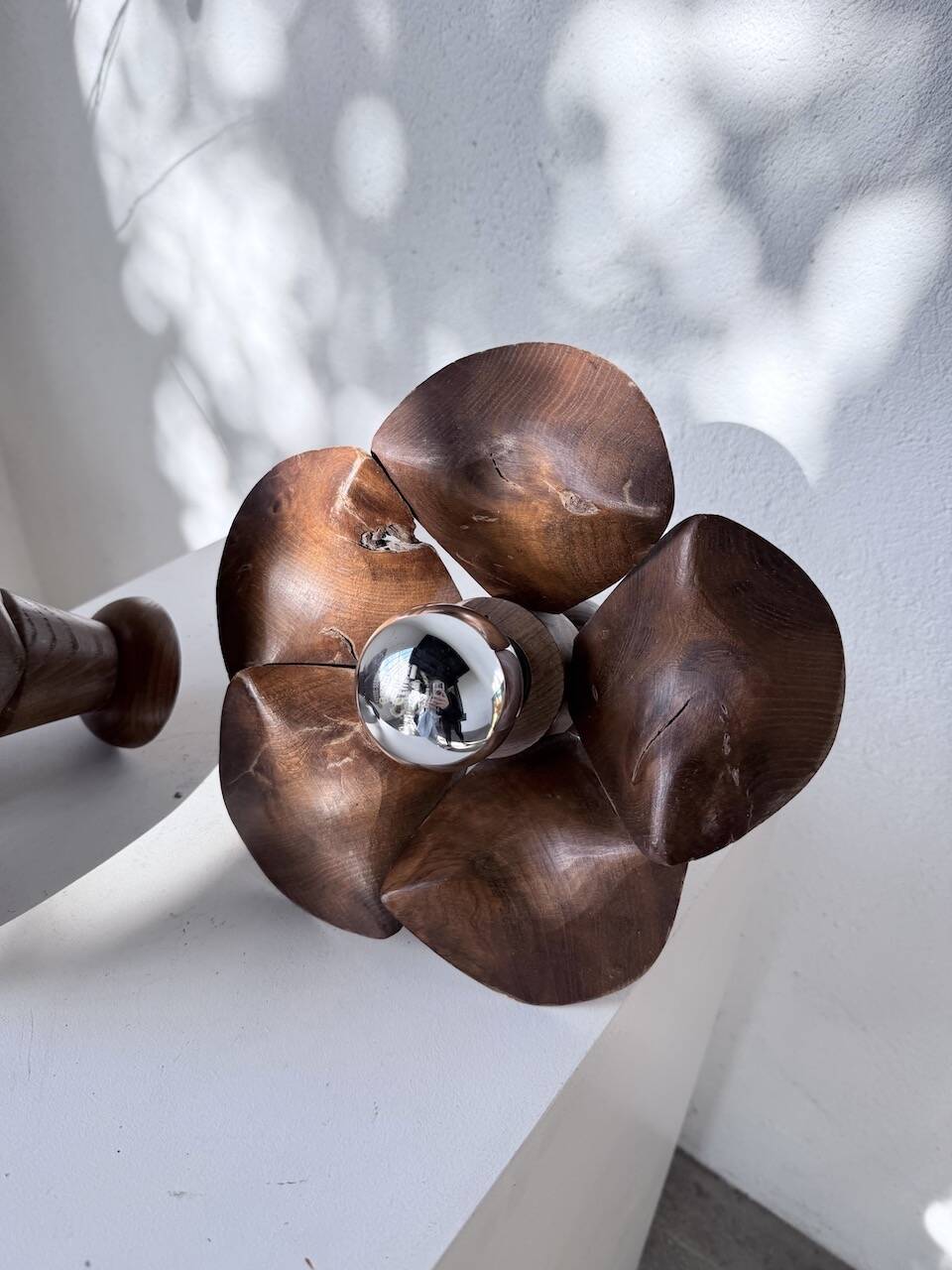 Four wooden flower wall lights from the 1970s.