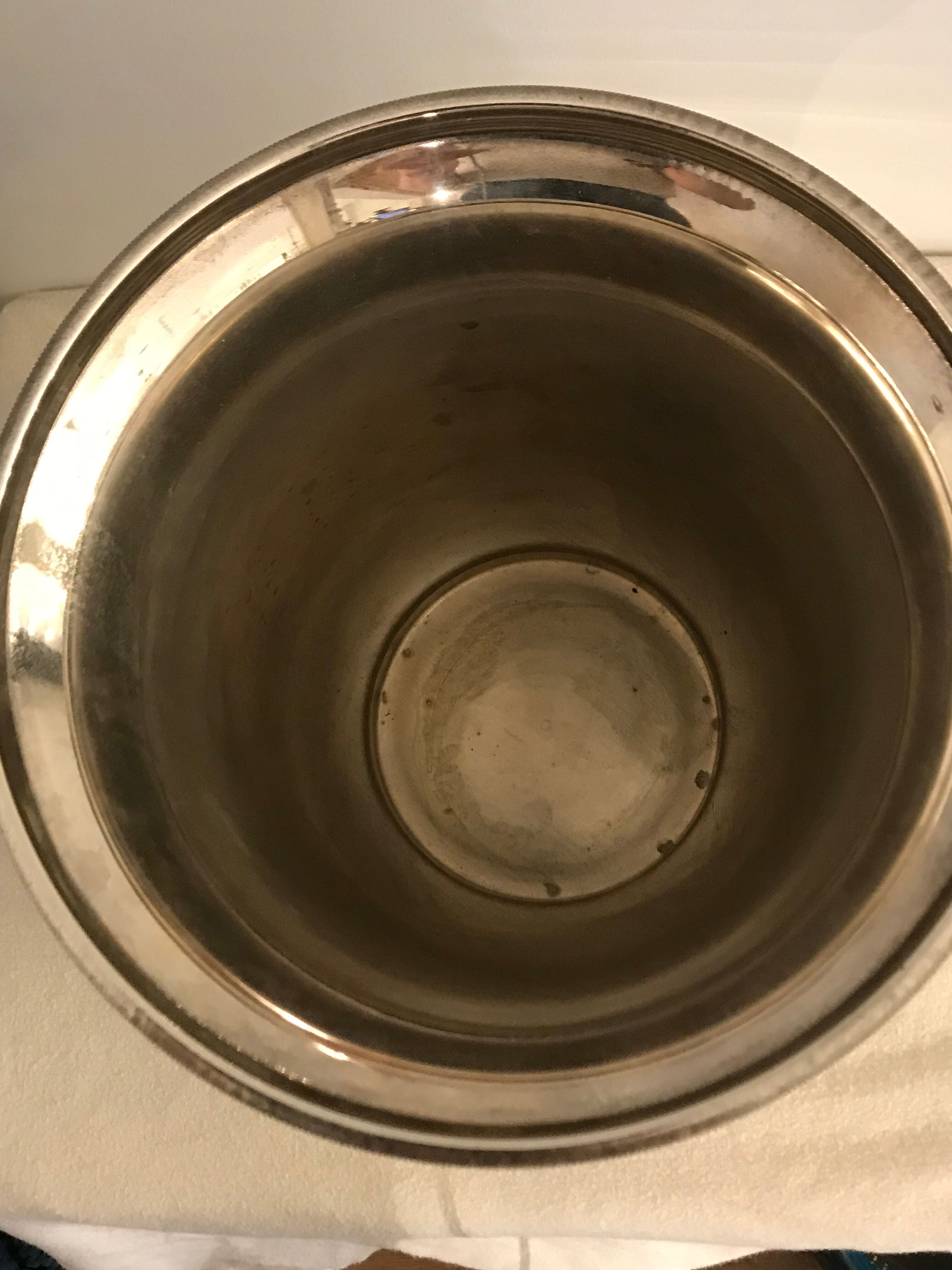 Ancient champagne bucket in silver metal with lion heads