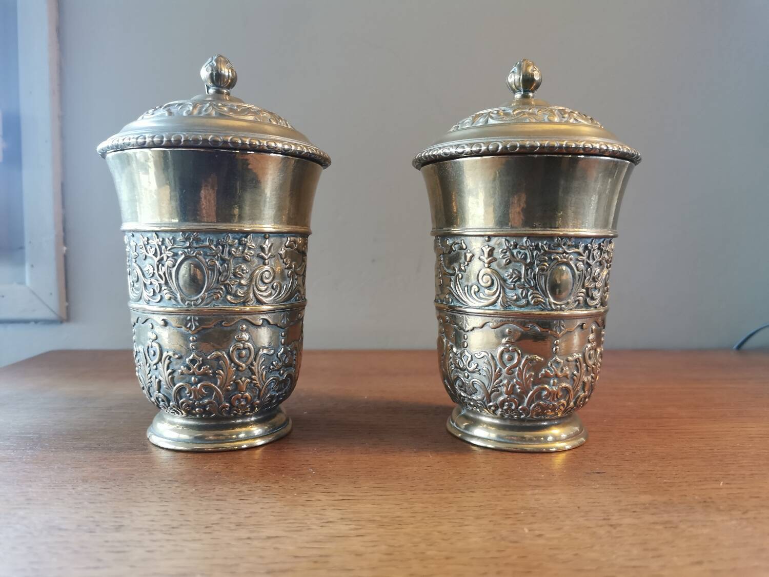 Pair of antique chiseled metal candy boxes