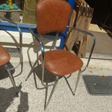 Set of 4 armchairs in chromed metal and brown imitation leather, circa 1960