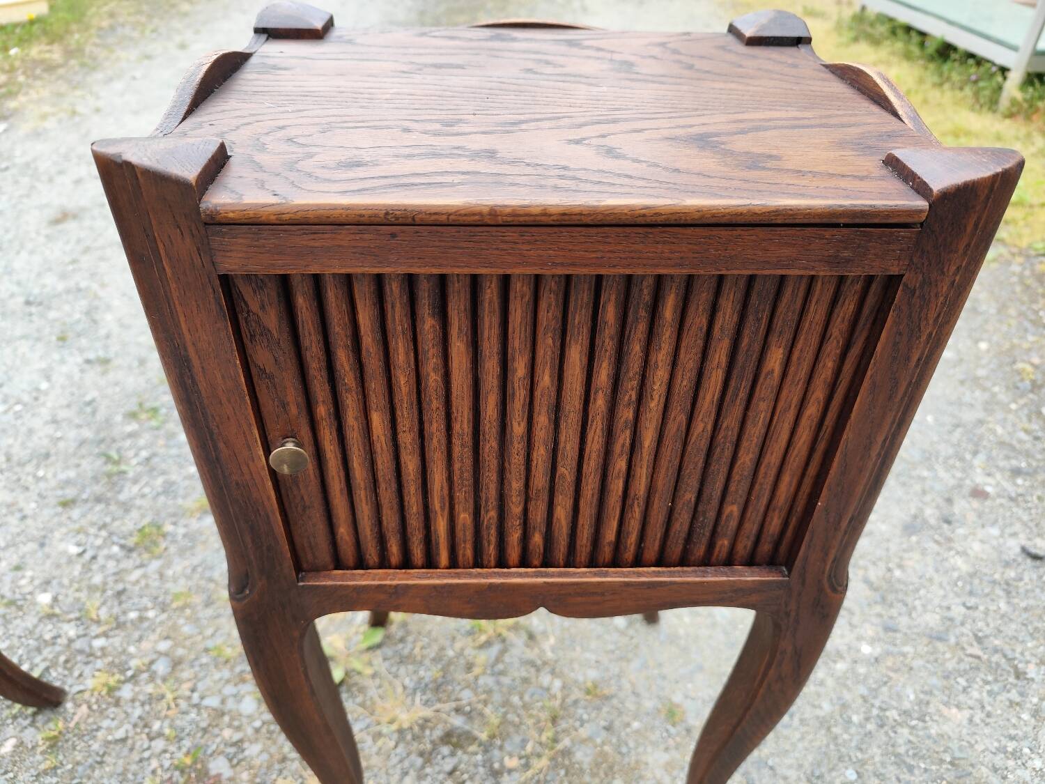 Pair of oak bedside tables with curtained niche doors