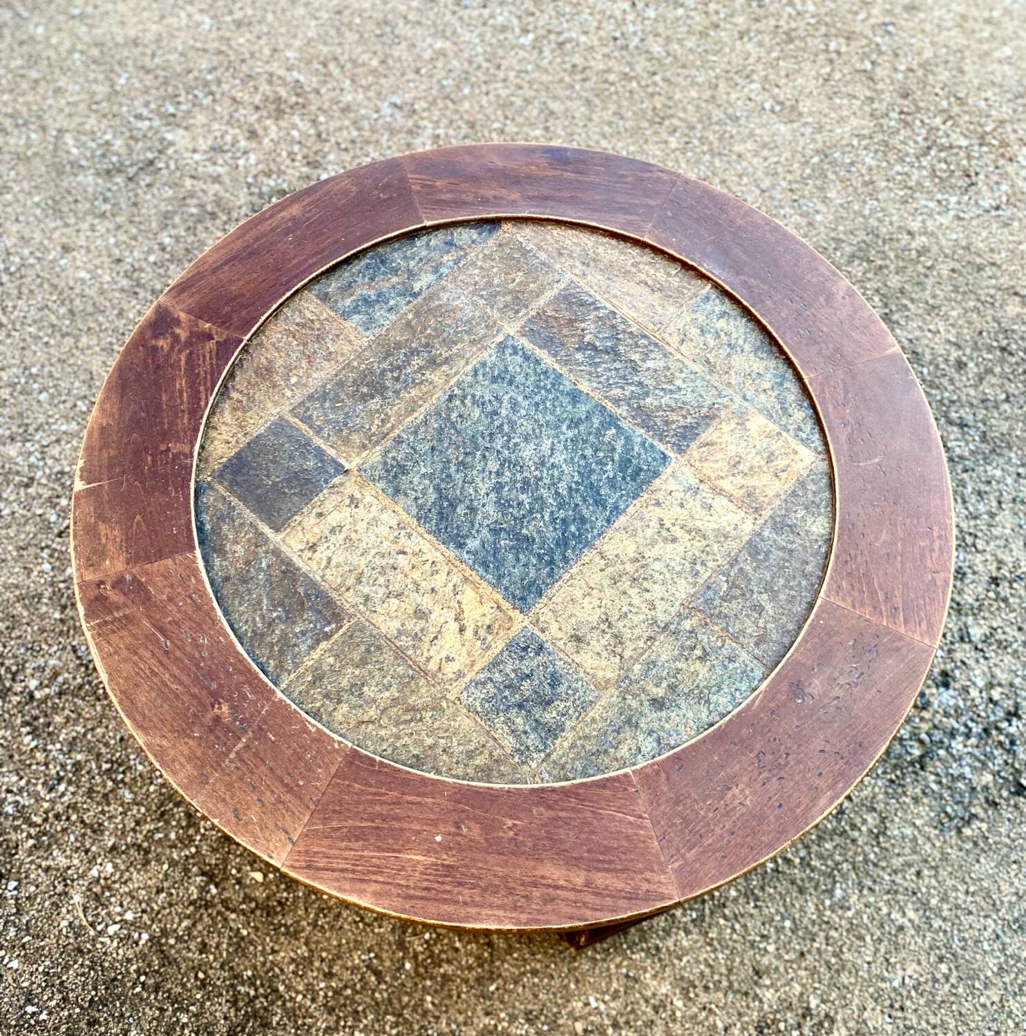 Round stone and wood coffee table