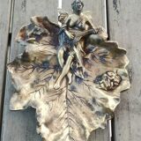 Art Nouveau pocket emptier/Woman with mandolin on vine leaves in spelter