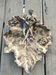 Art Nouveau pocket emptier/Woman with mandolin on vine leaves in spelter