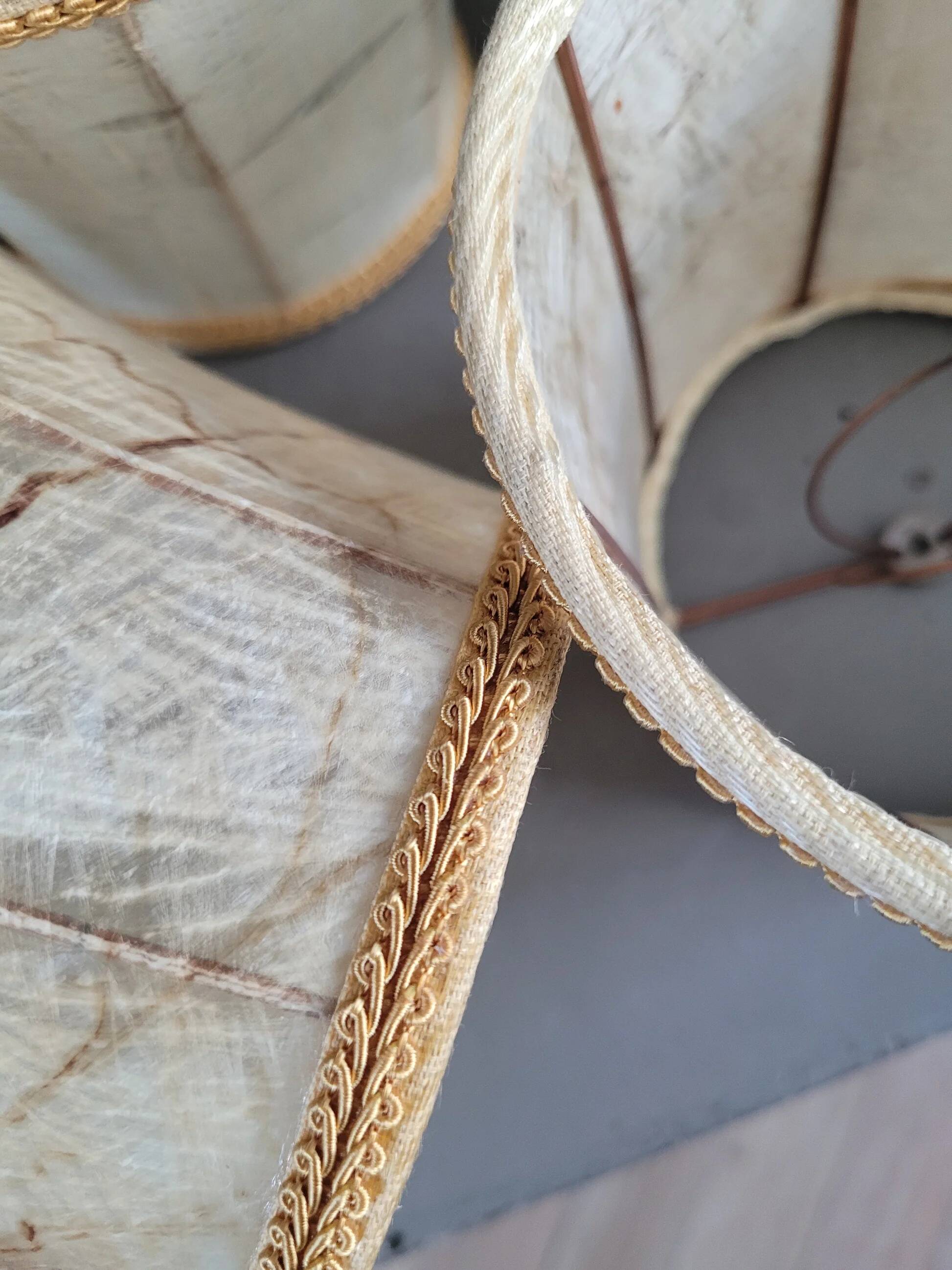 Set of 5 clip lampshades made from pig bladder.