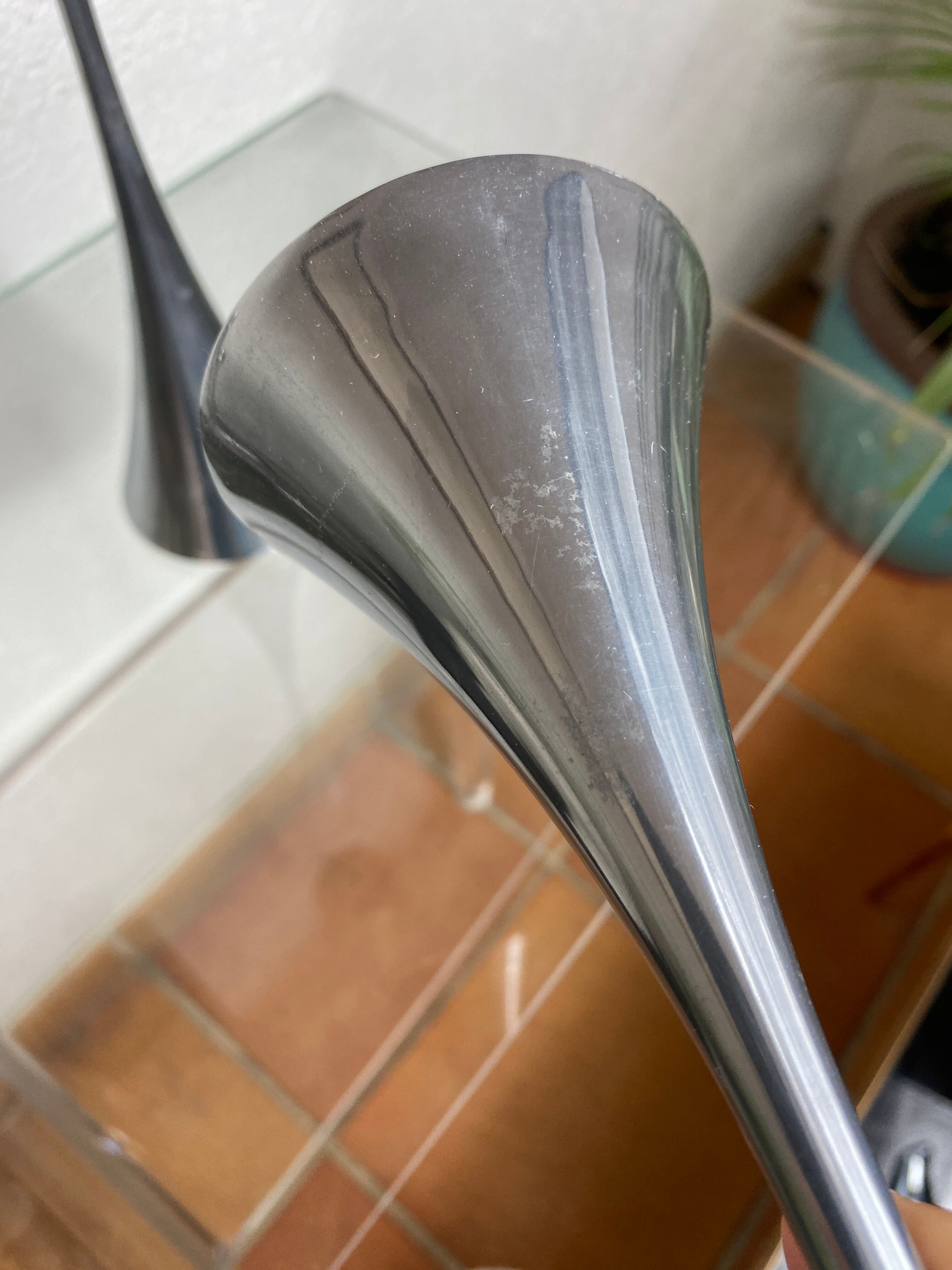 Pair of designer candle holders in stainless steel