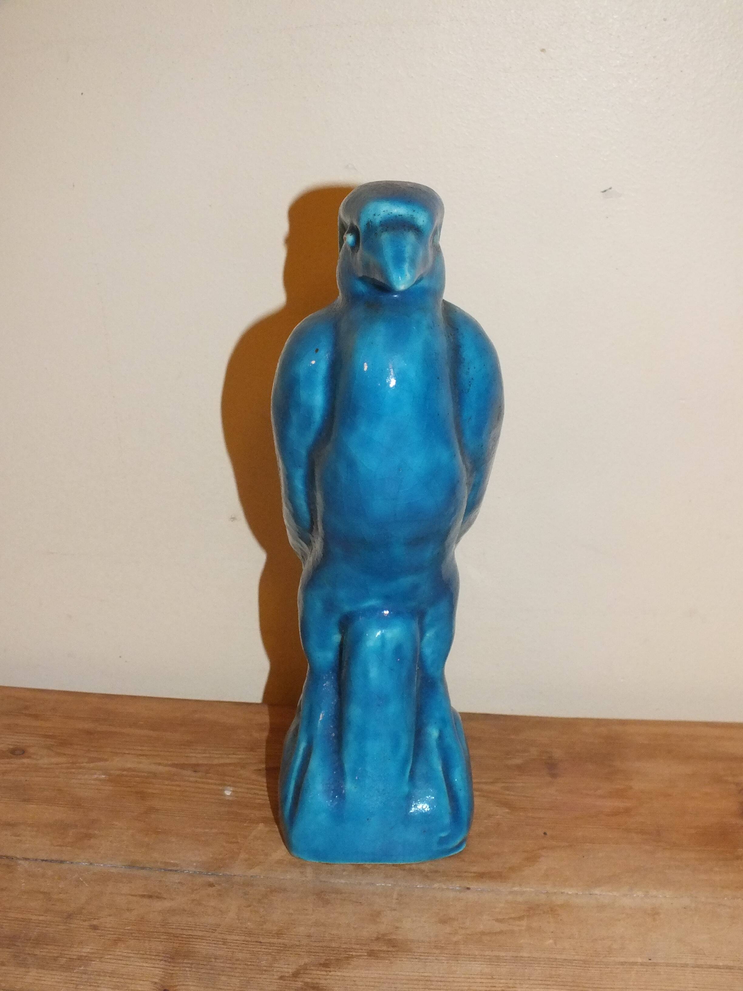 Bird, cracked blue raptor in ceramic