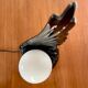 Ceramic wing and globe lamp