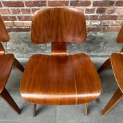 Set of 4 DCW chairs in walnut, Charles & Ray Eames, Herman Miller, 1950s