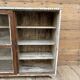 Teak display cabinet with sliding doors