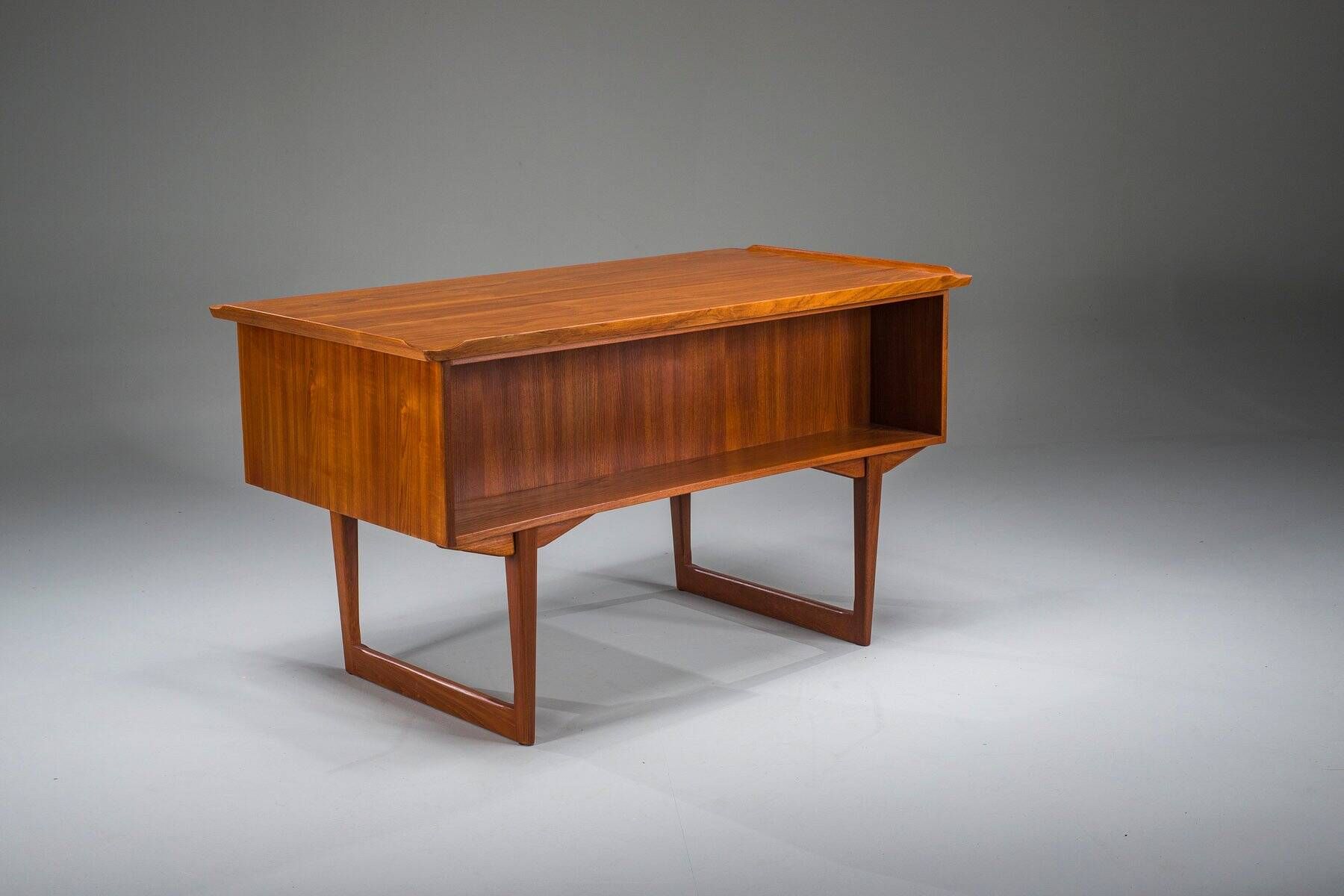 Mid-century Danish freestanding teak desk with raised lip edge, 1960s