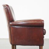 Sheep leather armchair correctly finished with decorative nails