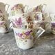 Antique flowered porcelain cups mismatched