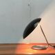 Metal table lamp model 6761 from the mid-century German period by Christian Dell for Kaiser Leuchten, 1960s.