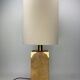 Cork and brass table lamp, bouclé shade. Leola Design Germany 1970s