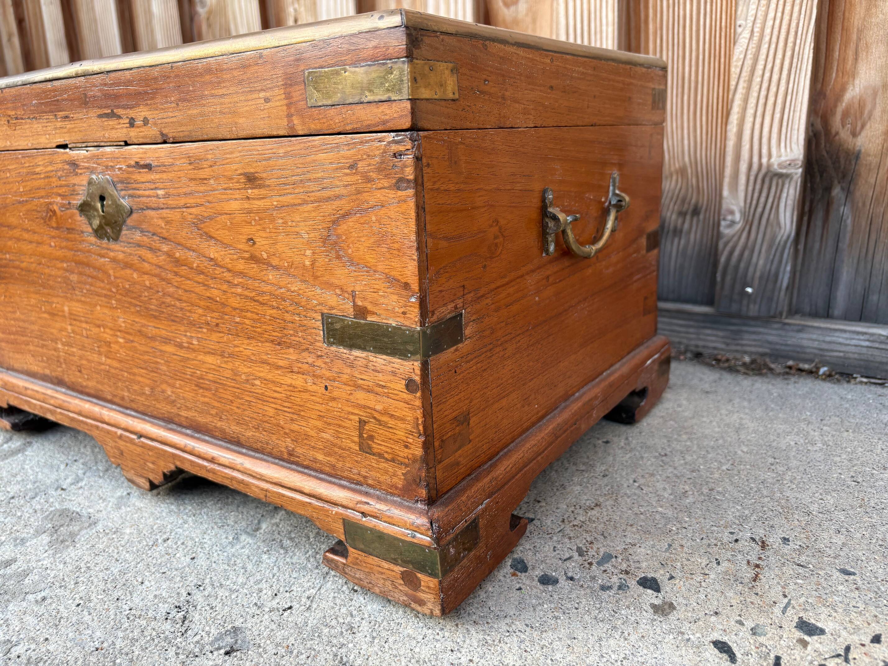 Antique camphor chest made of camphor wood and brass