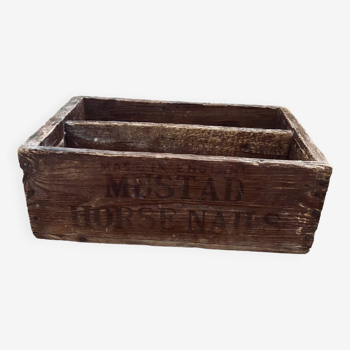 Old rustic wooden horse shoe box.