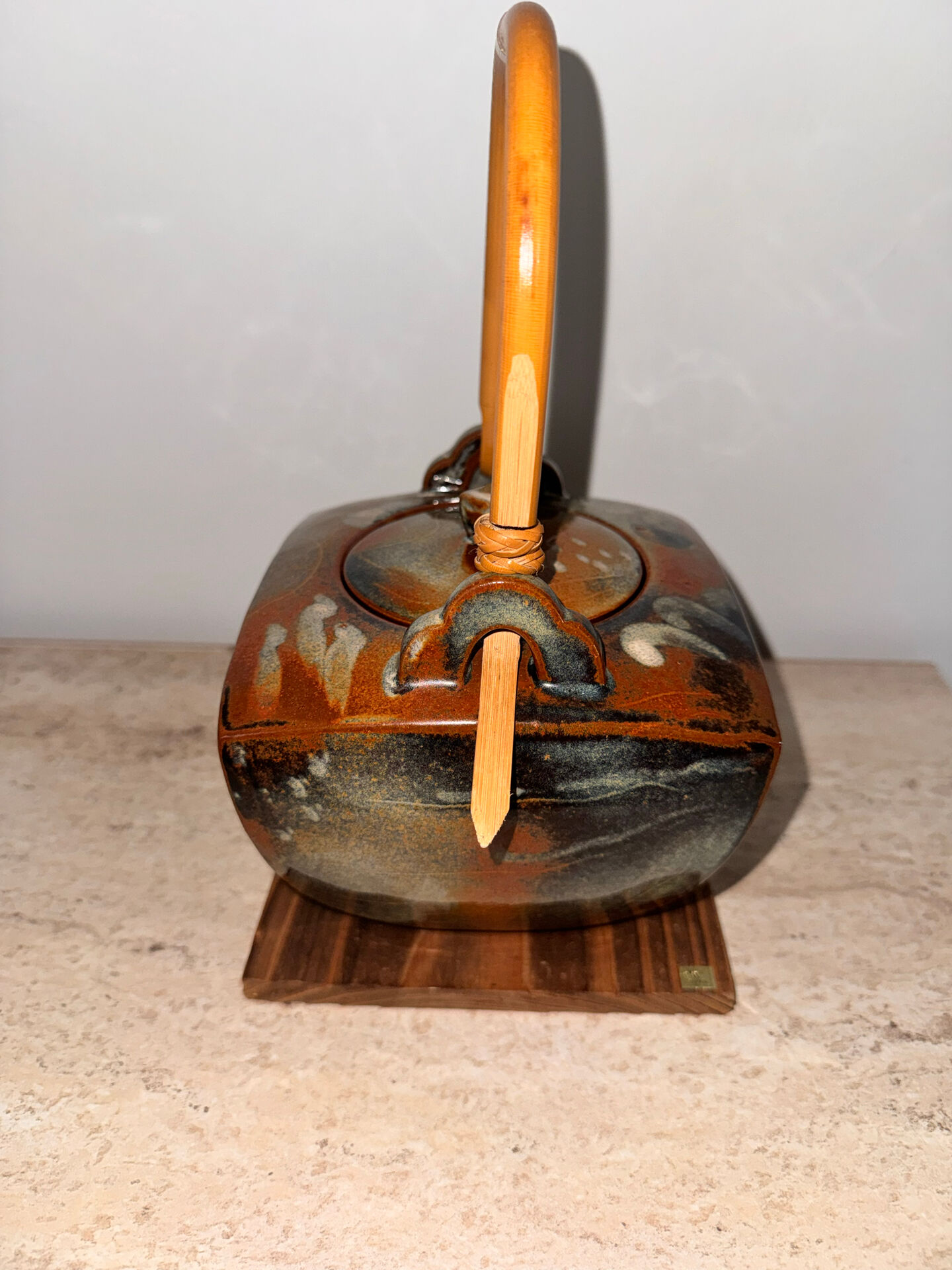 Ceramic teapots with bamboo handles by Elisabeth Wallet