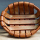 Braided basket in glazed terracotta