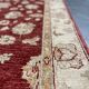 Tapis oriental en laine rouge motif floral,  fait main