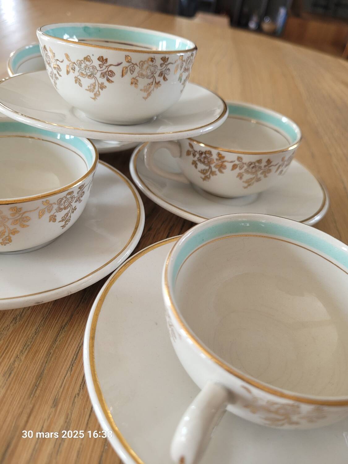 5 antique cups and saucers