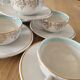 5 antique cups and saucers