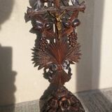 Antique wooden crucifix carved from the Black Forest with grapes and leaves.