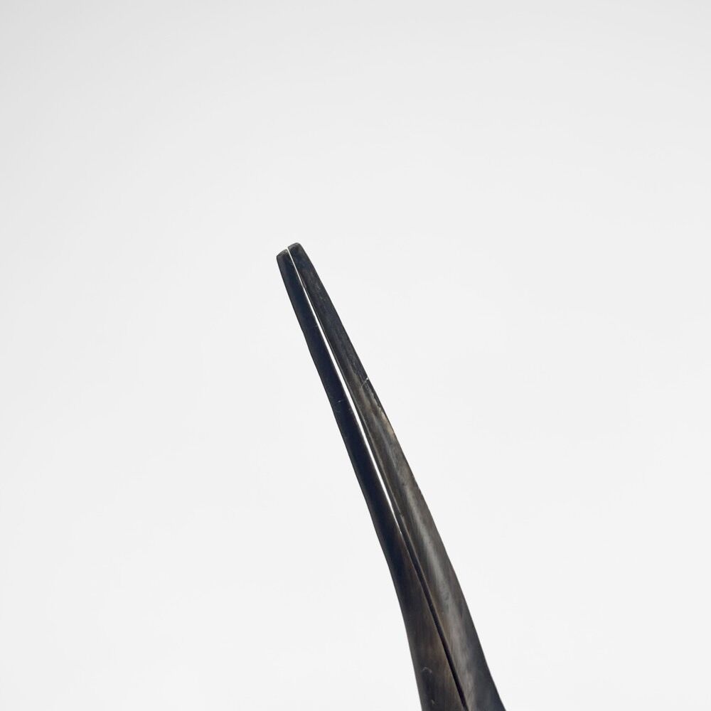Pair of cranes in carved horn design Mid-Century